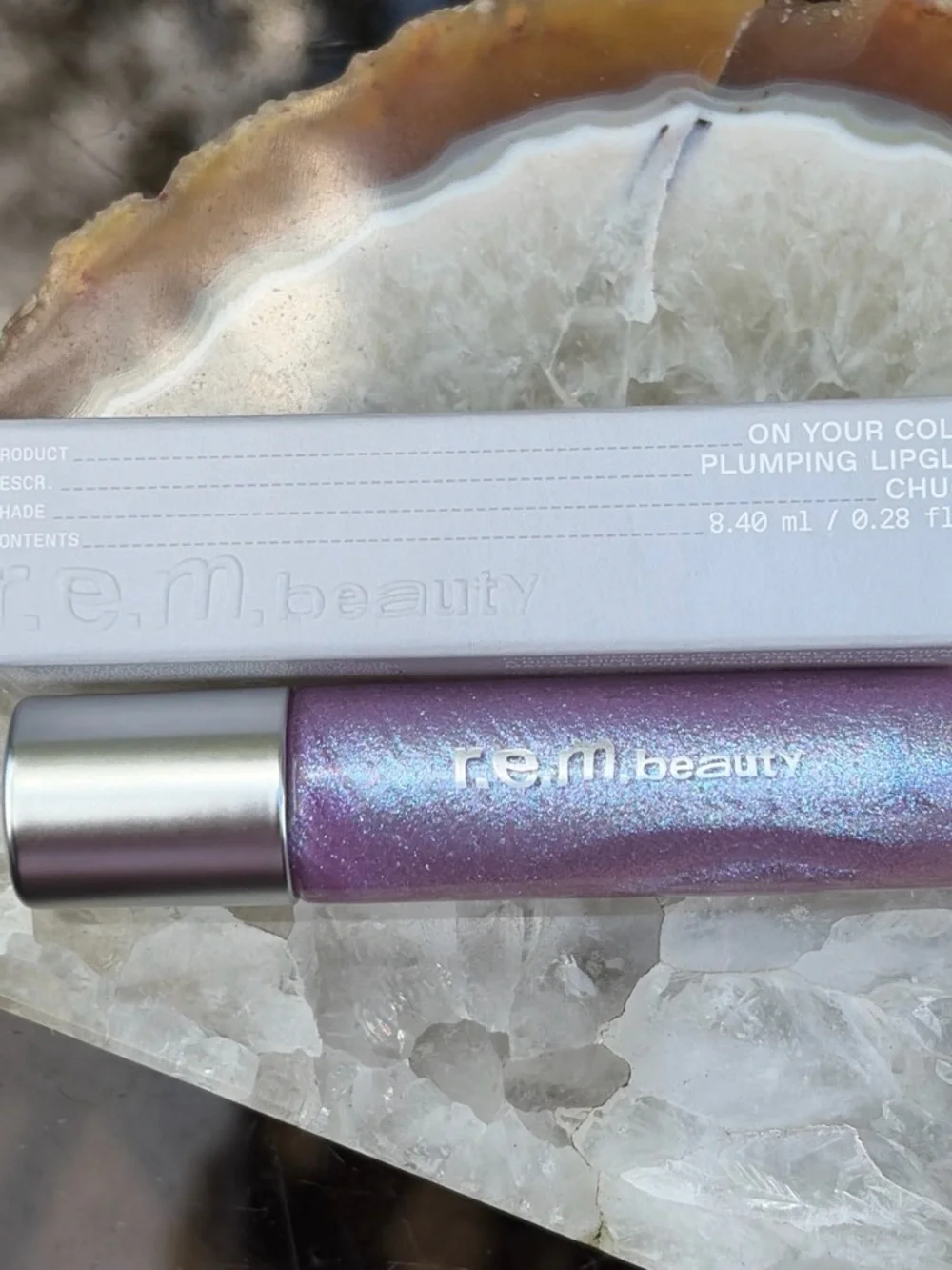 REM Beauty Plumping Lipgloss in Chuckie - Iridescent Lavender